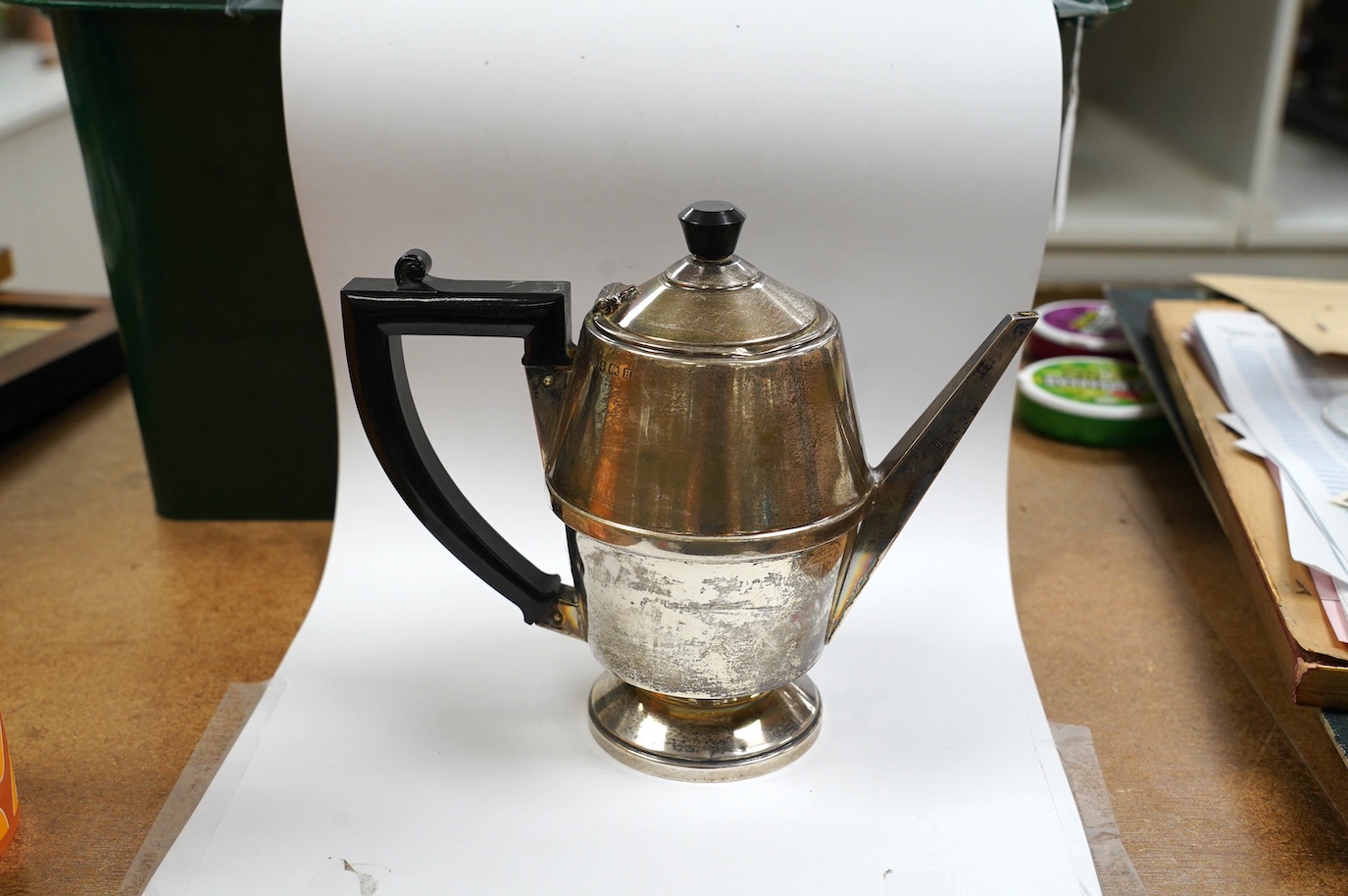 A George V Art Deco silver coffee pot, A L Davenport Ltd, Birmingham, 1932, height 16.9cm, gross weight 10.8oz. Condition - fair